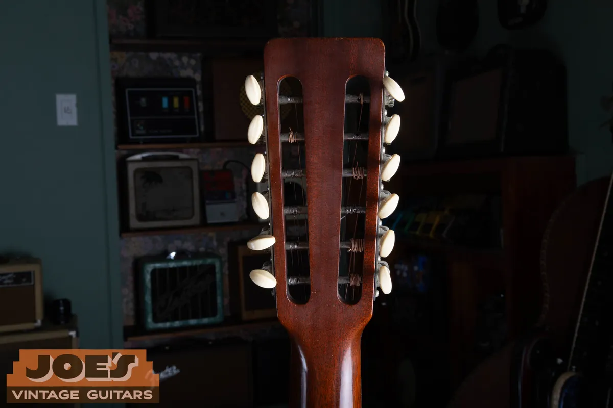 Rear of a 1969 Martin D12-35 slotted headstock with twelve tuning buttons