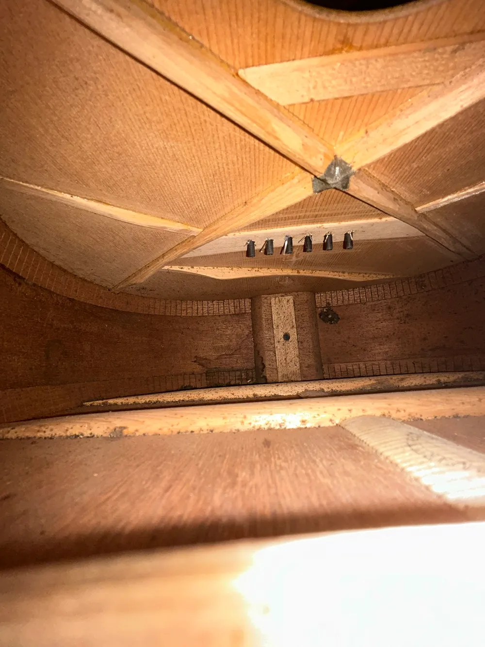 X-bracing and bridge plate inside a 1914 Martin 0-18