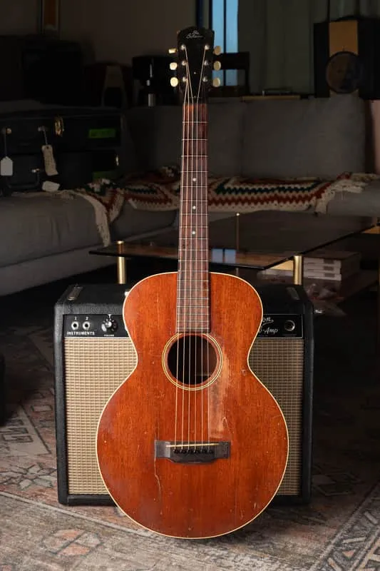 Early all-mahogany Gibson L-0 with rounded body and natural brown finish