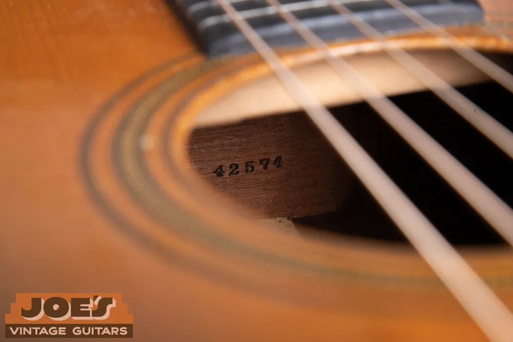 Serial number on the neck block of a 1930 Martin 0-21 with no model stamp above it