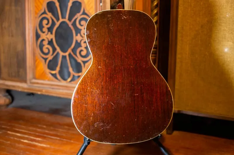 Back of the sunburst Gibson L-00 showing its brown wood finish and bound edge
