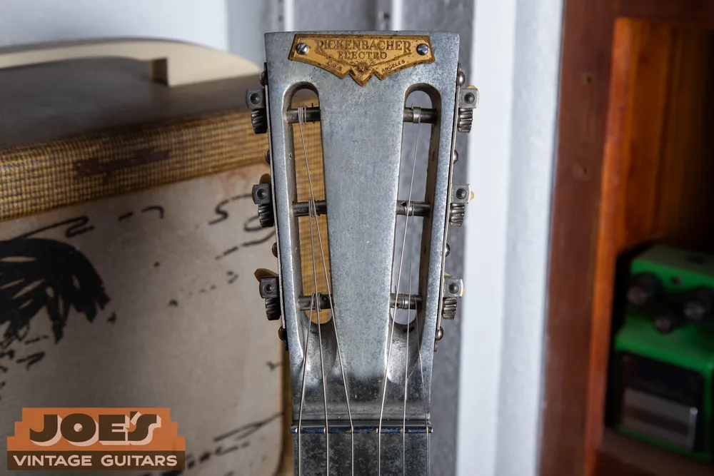 Archive 1930s Rickenbacher A-22 Frying Pan: Slotted headstock and Rickenbacher Electro badge. Photograph spelling and markings exactly as they appear.