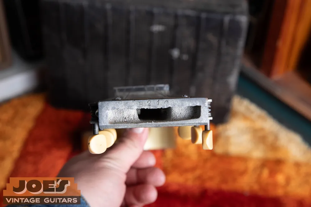 Archive 1930s Rickenbacher A-22 Frying Pan: Tuner and headstock detail. Inspect for added string positions or replacement hardware.