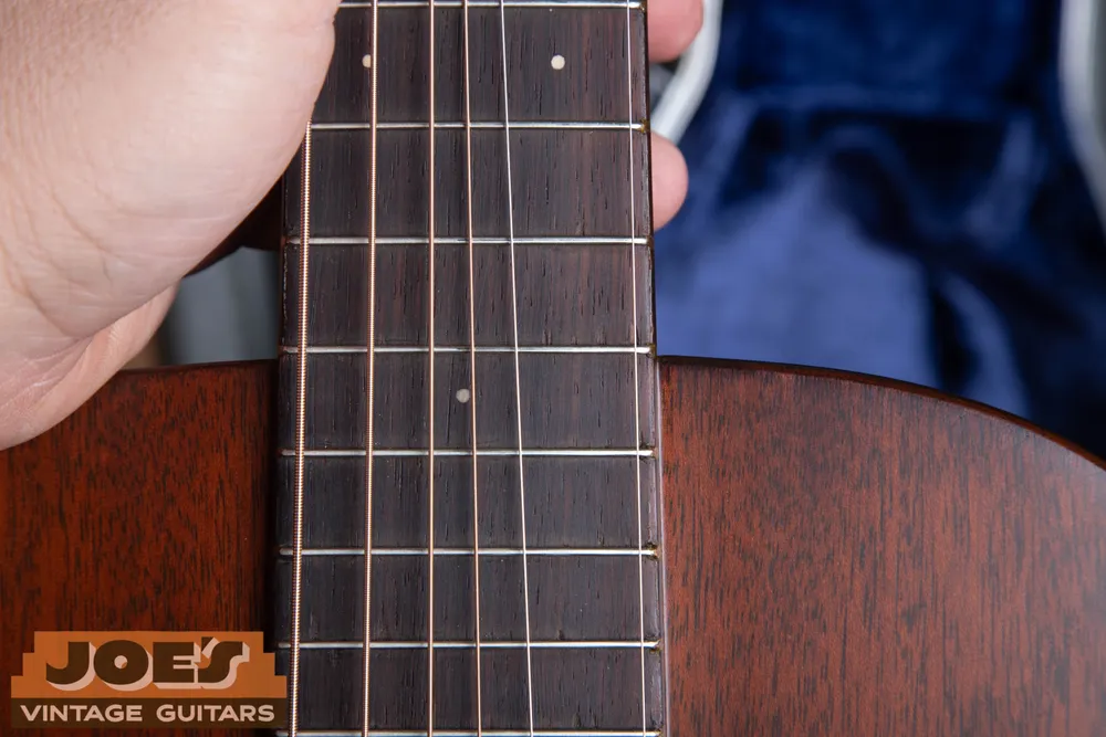 Close view of round fingerboard dots on Joe’s 1937 Martin 0-17