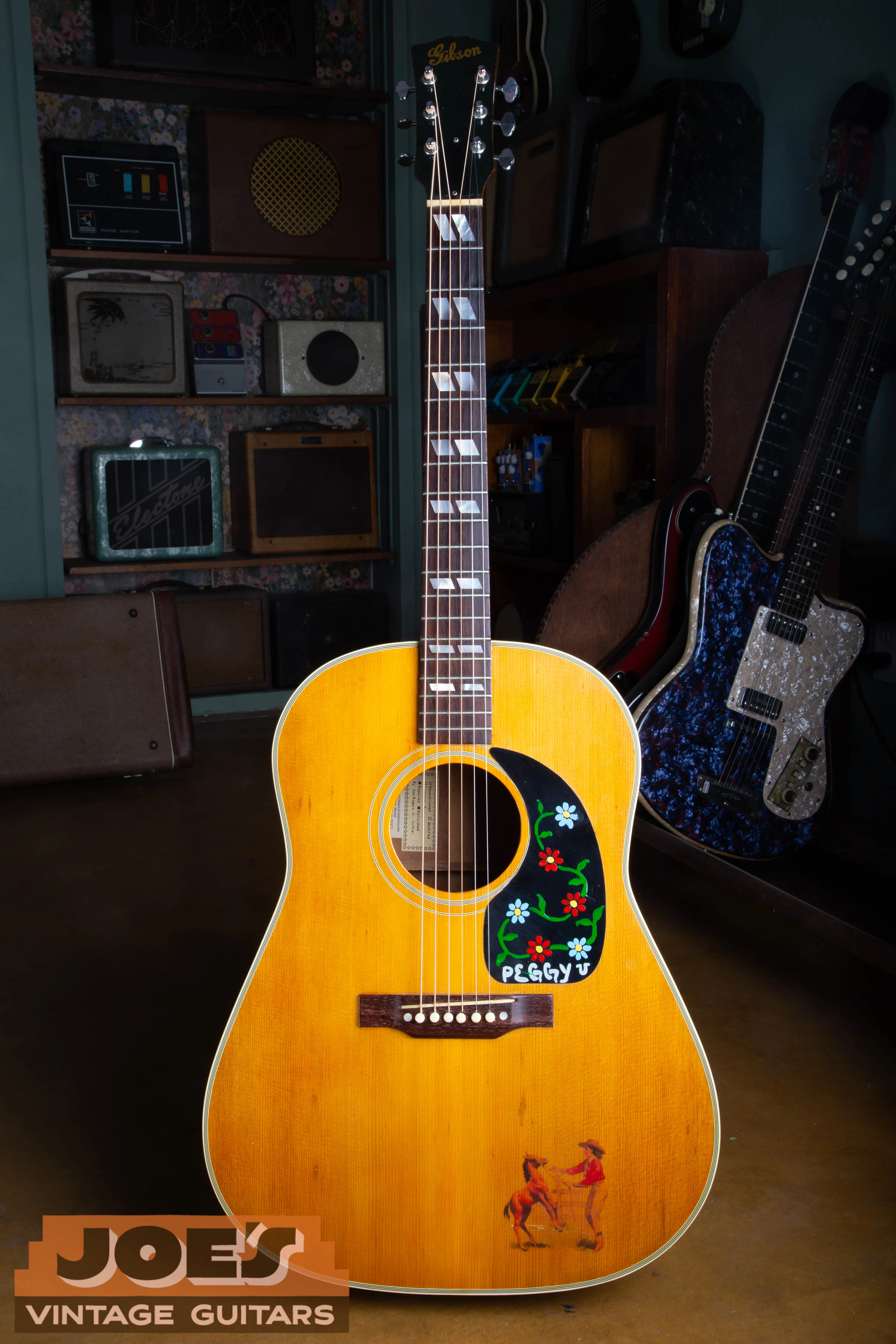 Script headstock and split fingerboard markers on the refinished natural 1946 Southern Jumbo