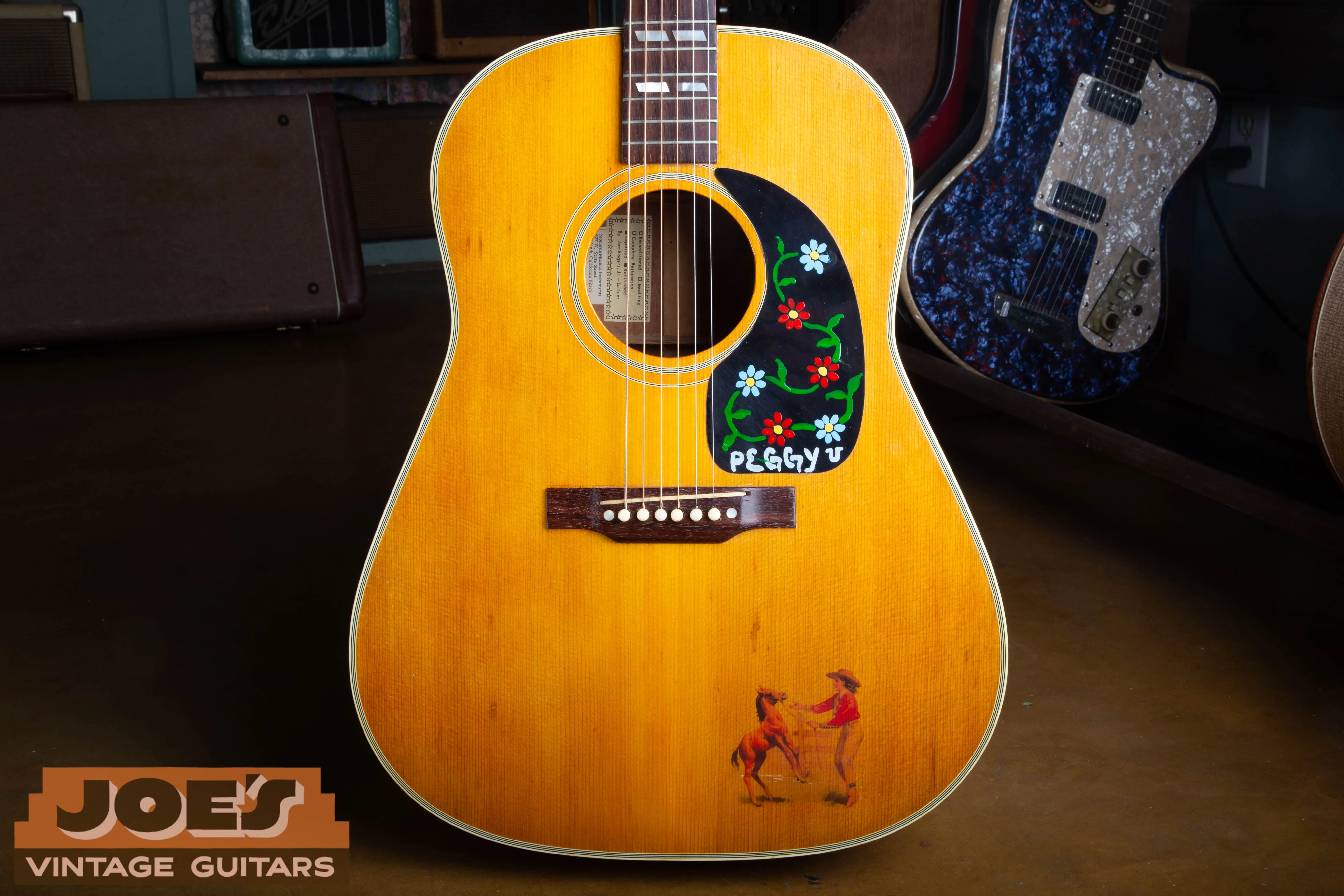 Refinished 1946 Southern Jumbo with natural top and hand-painted replacement guard