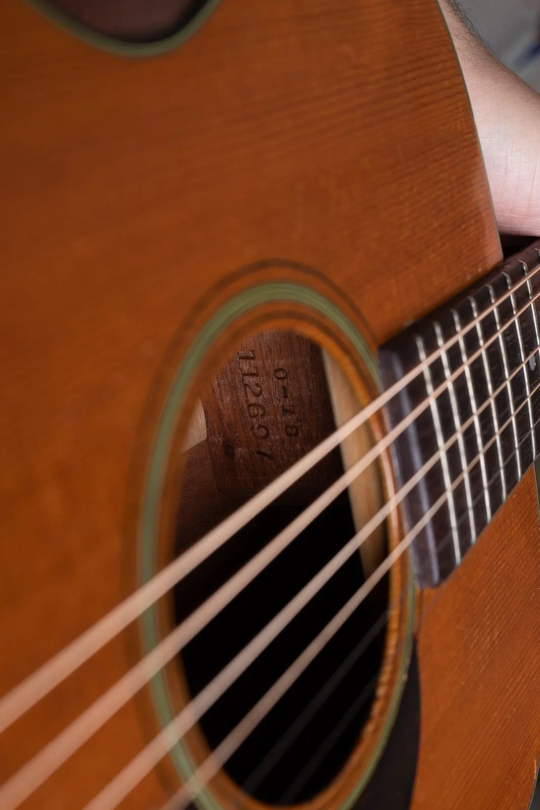 Neck-block stamp inside the soundhole of the 1949 Martin showing model 0-18 above the serial number