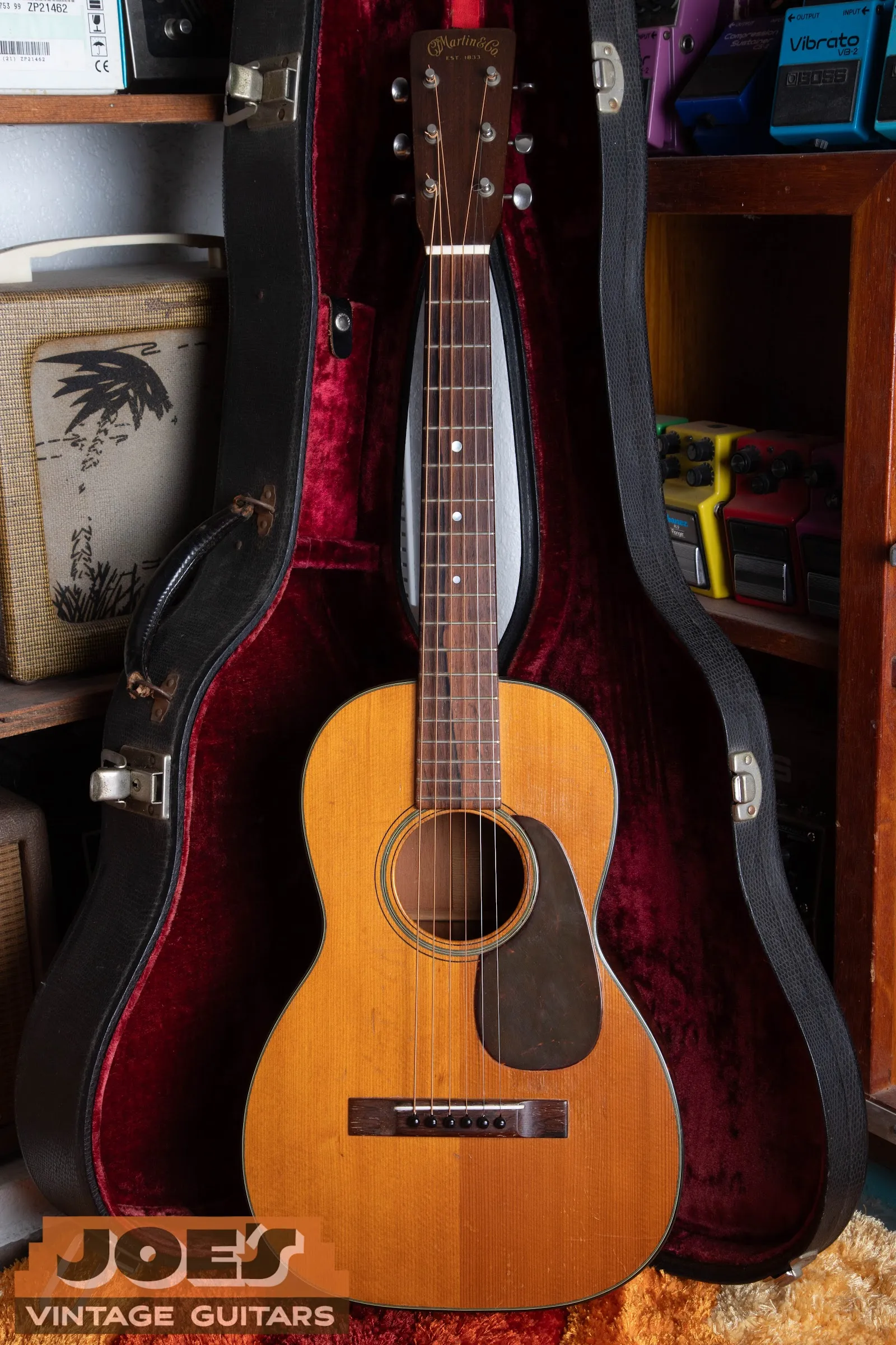 1950 Martin 5-18 Terz lying in an open red-lined hardshell case, full front view.