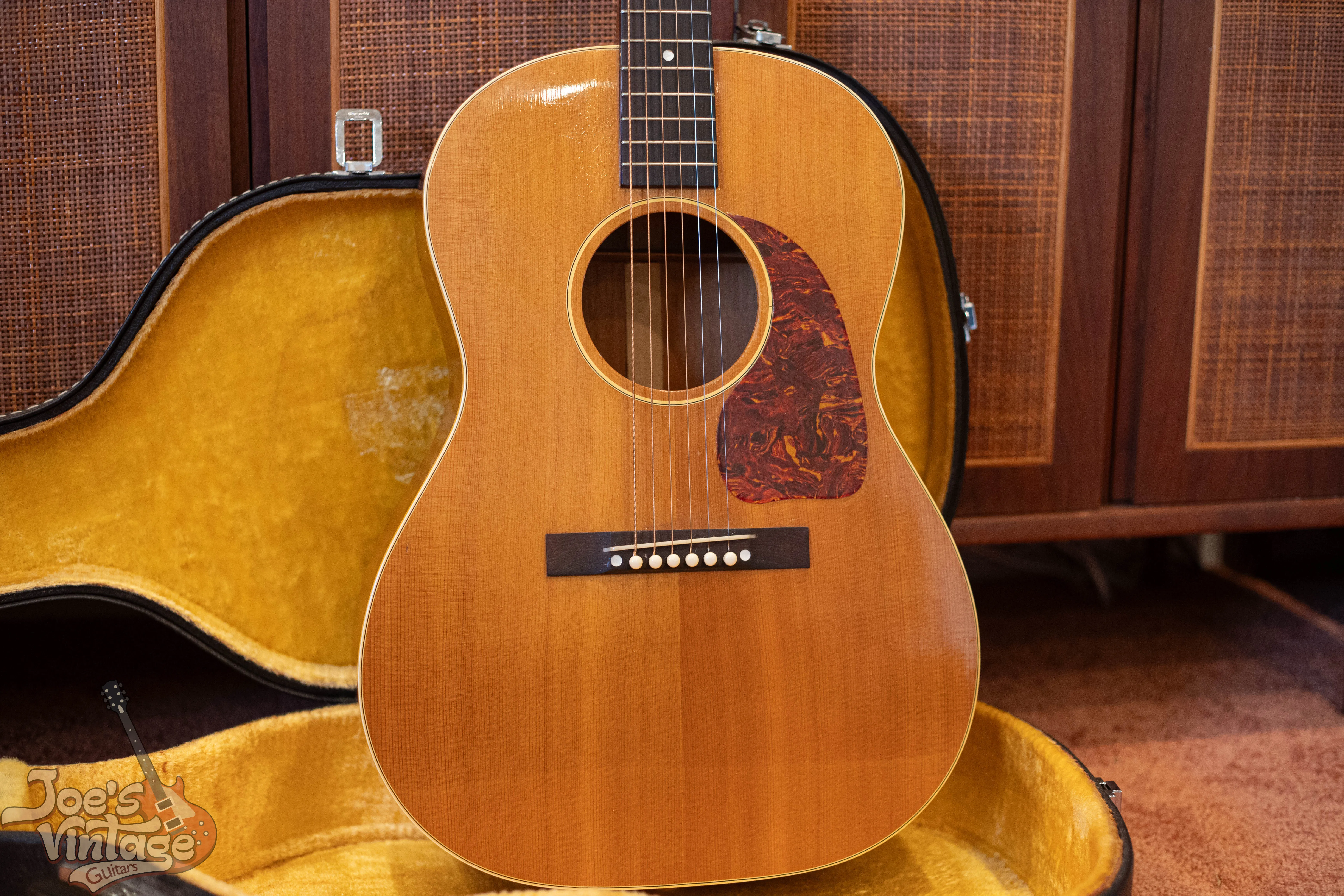 Natural-finish LG-3 with a rectangular bridge in a yellow-lined case