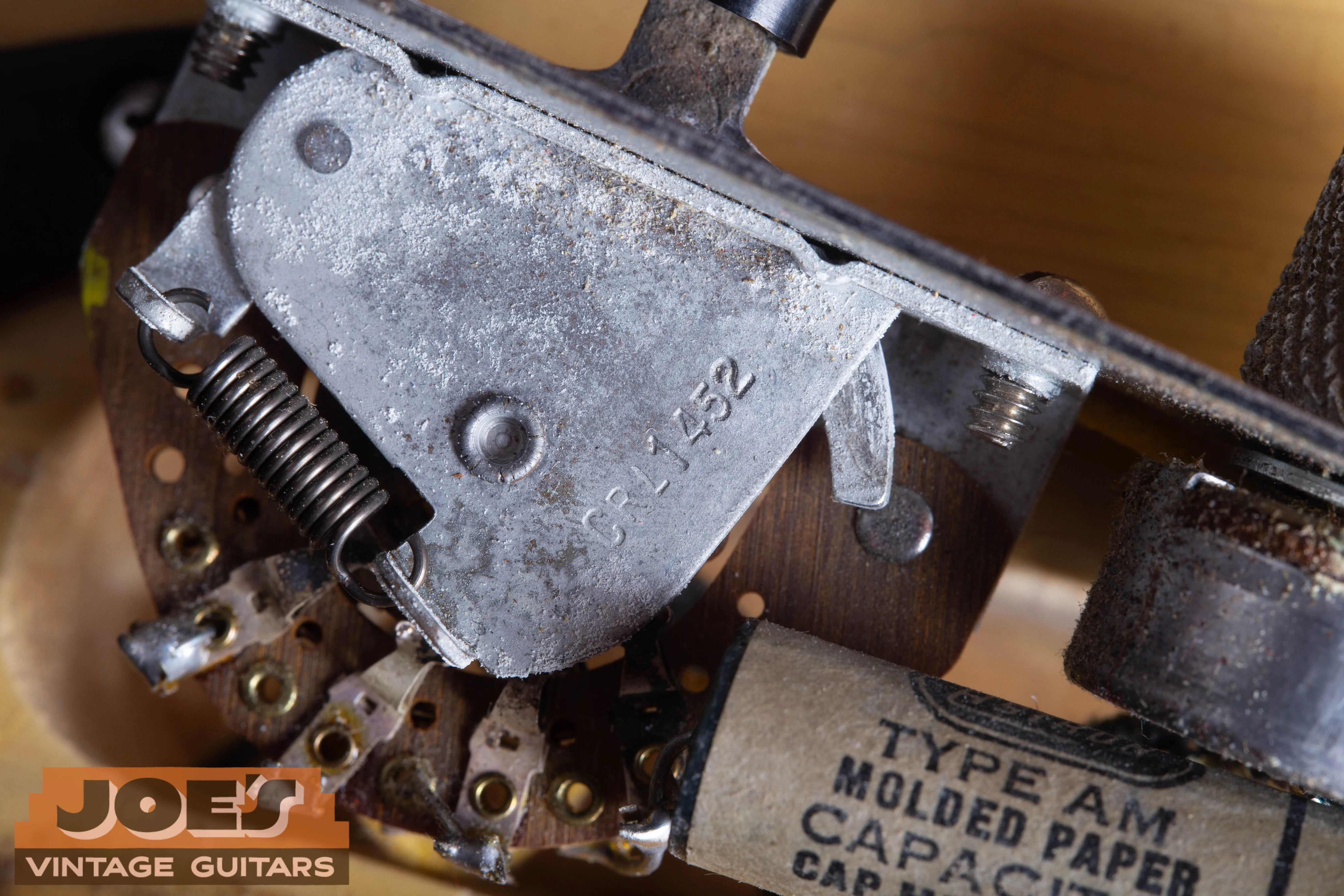 Internal view of a 1952 Fender Telecaster 3-way selector switch clearly showing the “CRL 1452” factory stamp.