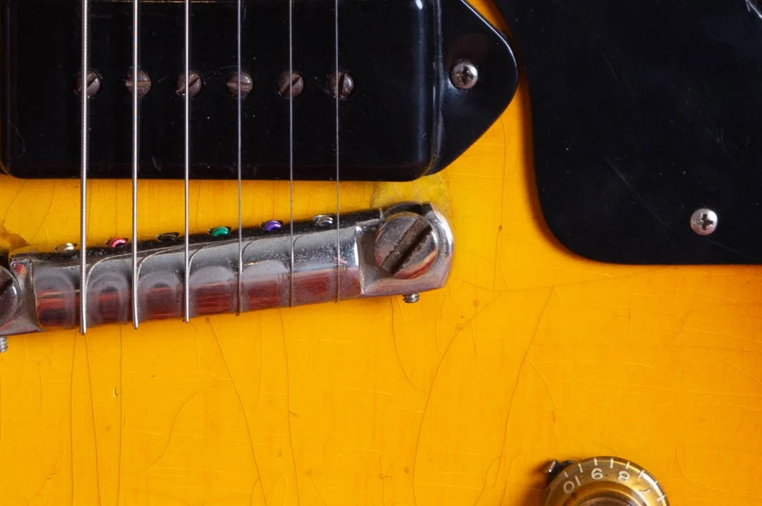 Dog-ear P-90 mounted close to the wraparound bridge on a 1955 Gibson Les Paul Junior