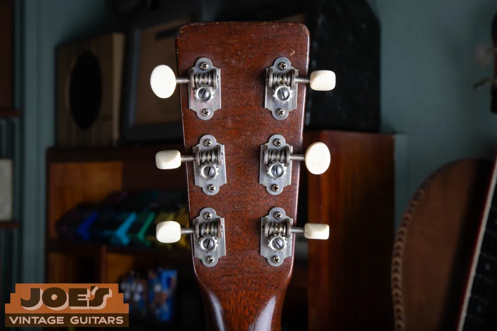 Waverly round-end open-gear tuners with cream plastic buttons on a 1955 Martin 0-15