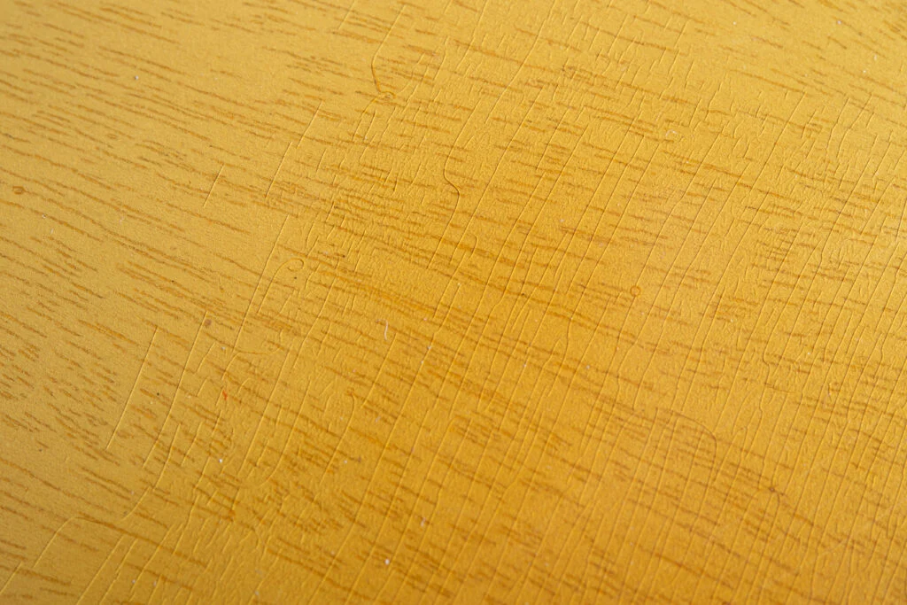 Close-up of checked translucent TV Yellow lacquer on a 1956 Gibson Les Paul Special