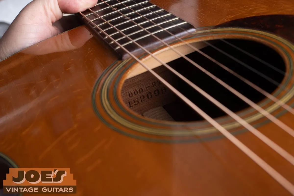 The neck block inside the 1956 Martin showing model 000-21 and serial number 152698