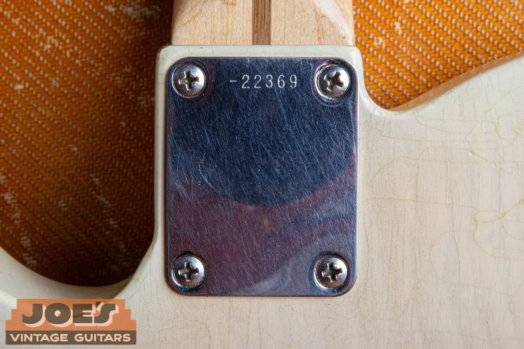 The neck plate of a 1957 Fender Esquire with the serial number stamped at the top edge