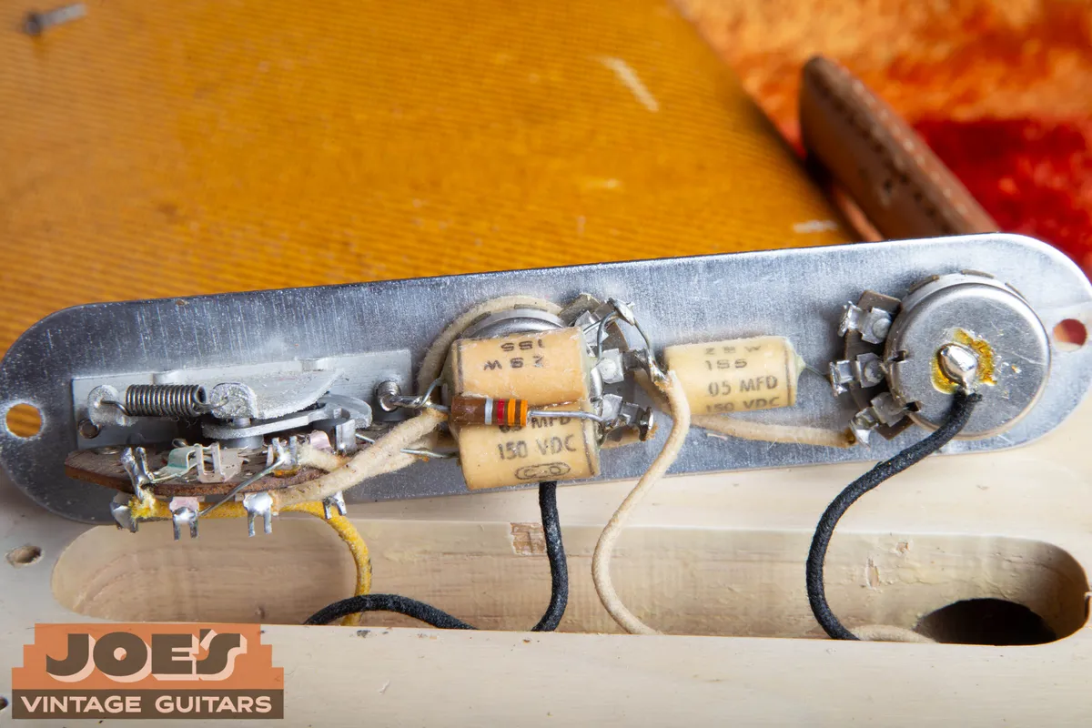 1957 Fender Esquire three-way switch, cloth wiring, pots, resistor, and capacitor network