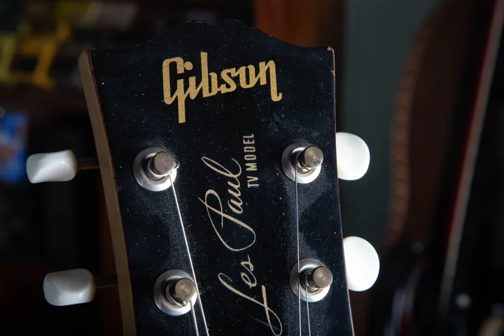 Gold Gibson and Les Paul TV Model silk-screen on a 1957 headstock