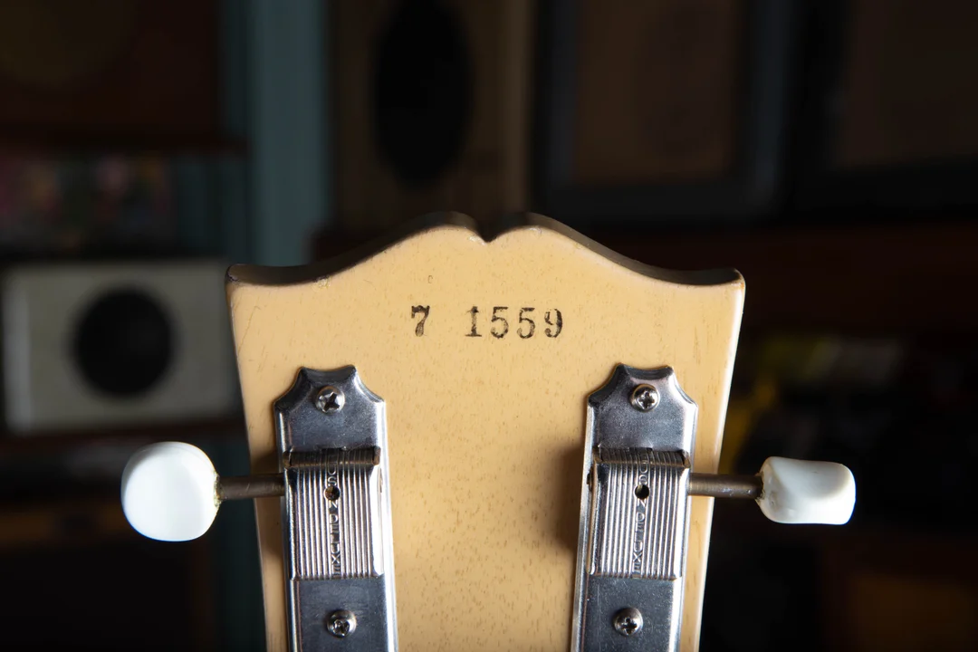 Black ink serial beginning with 7 on the back of a Gibson Les Paul TV Model headstock