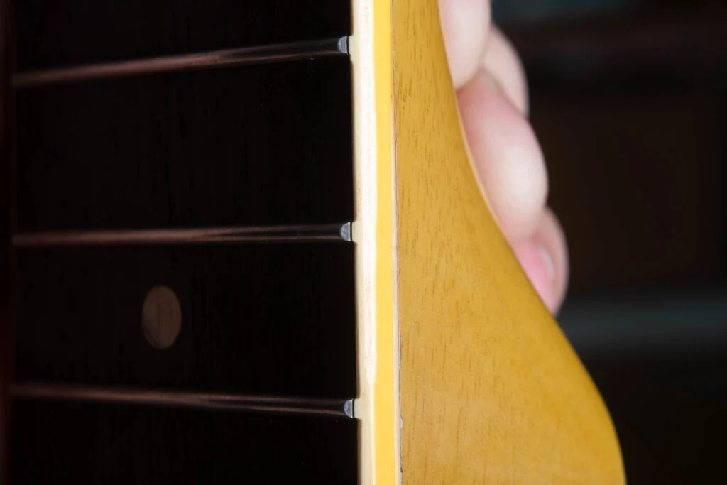 Binding nibs covering fret ends on a 1958 Gibson Les Paul Special