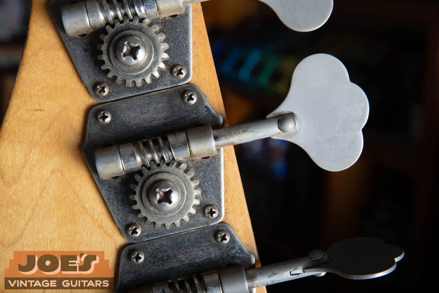 The back of a reverse-wind nickel plated tuner on a 1959 Fender Precision Bass