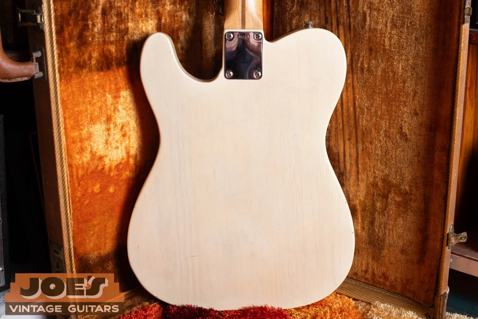 The top-loading bridge on a 1959 Fender Telecaster, with the strings anchoring at the back of the bridge plate