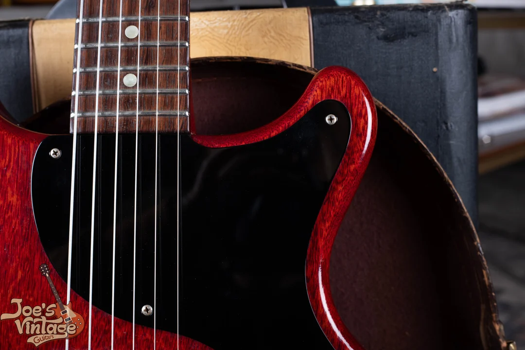 Black pickguard on a cherry 1959 Gibson Les Paul Junior
