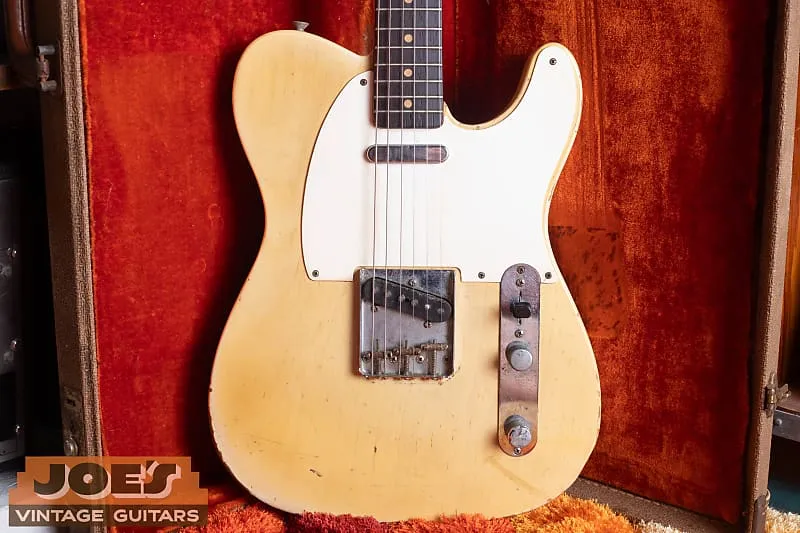 Front of the blonde 1960 Fender Telecaster resting in its red lined hardshell case