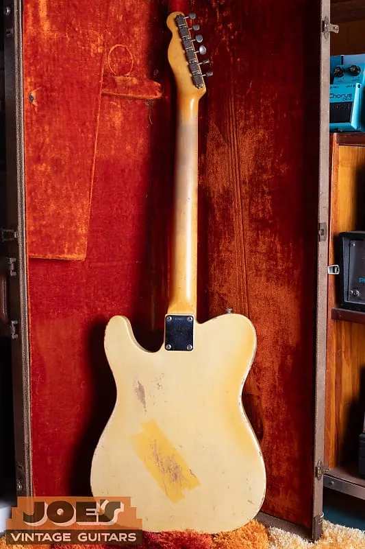Full back view of the blonde 1960 Fender Telecaster in its red lined hardshell case