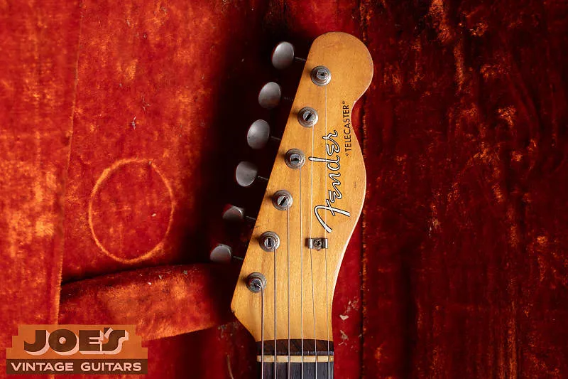 Headstock of an original 1960 Fender Telecaster with a silver spaghetti logo
