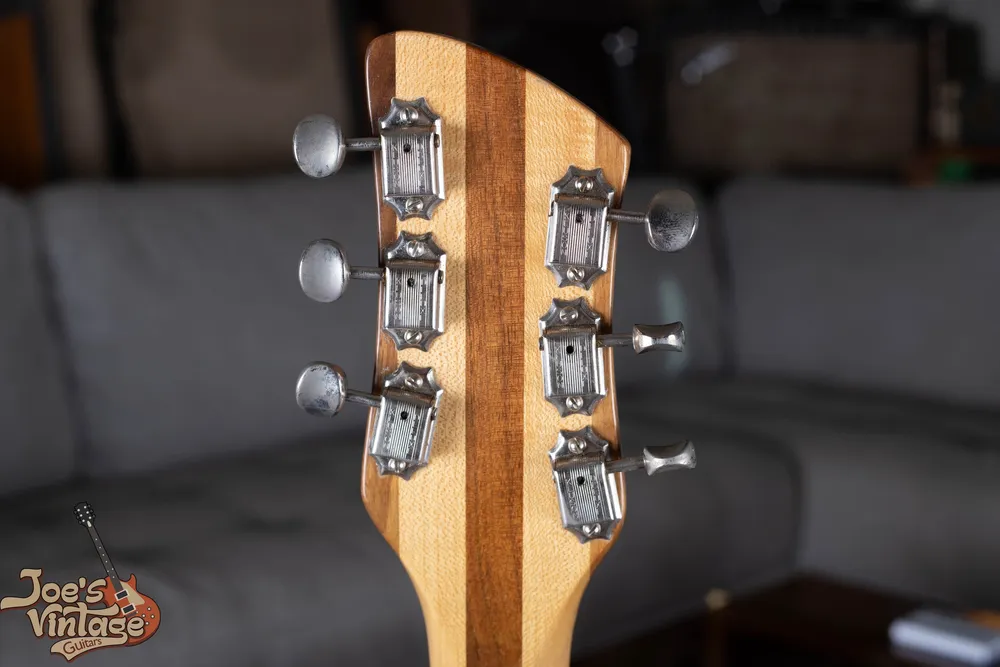 Archive 1960s Rickenbacker 360 in Mapleglo: Rear headstock with closed-housing tuners. Mounting details can reveal replacements.