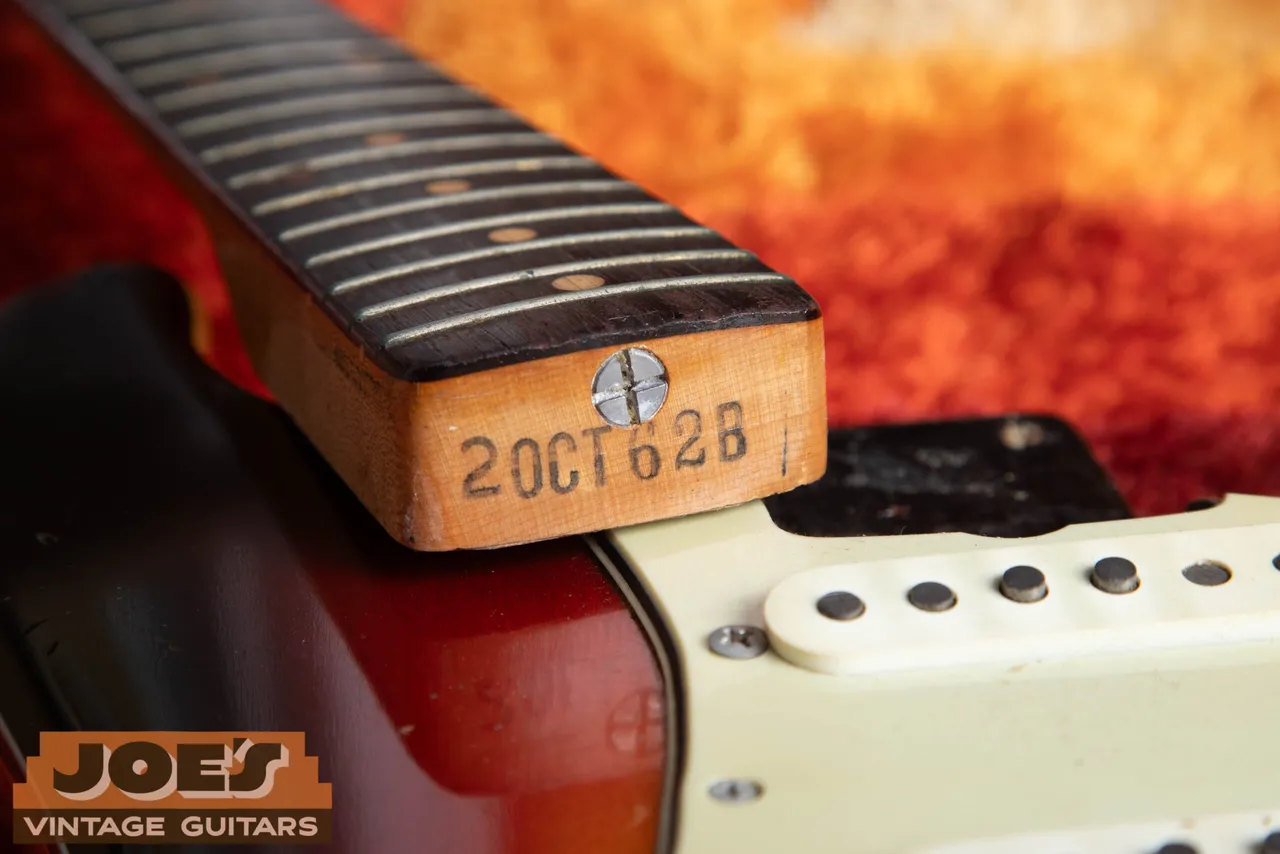 The neck heel of a 1962 Fender Stratocaster with a rubber-stamped month and year date on the butt end