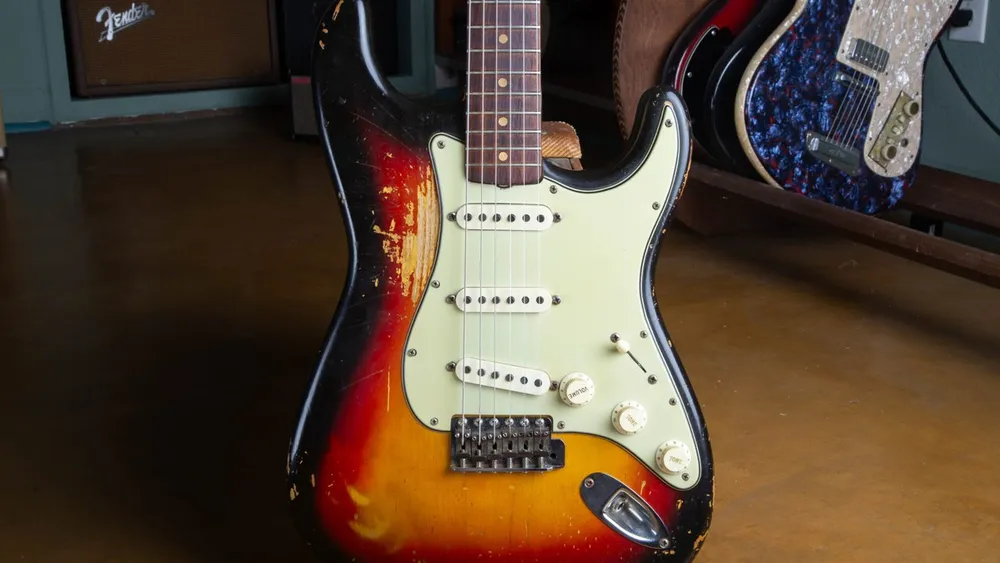 Original heavily played 1963 Fender Stratocaster in three-color sunburst