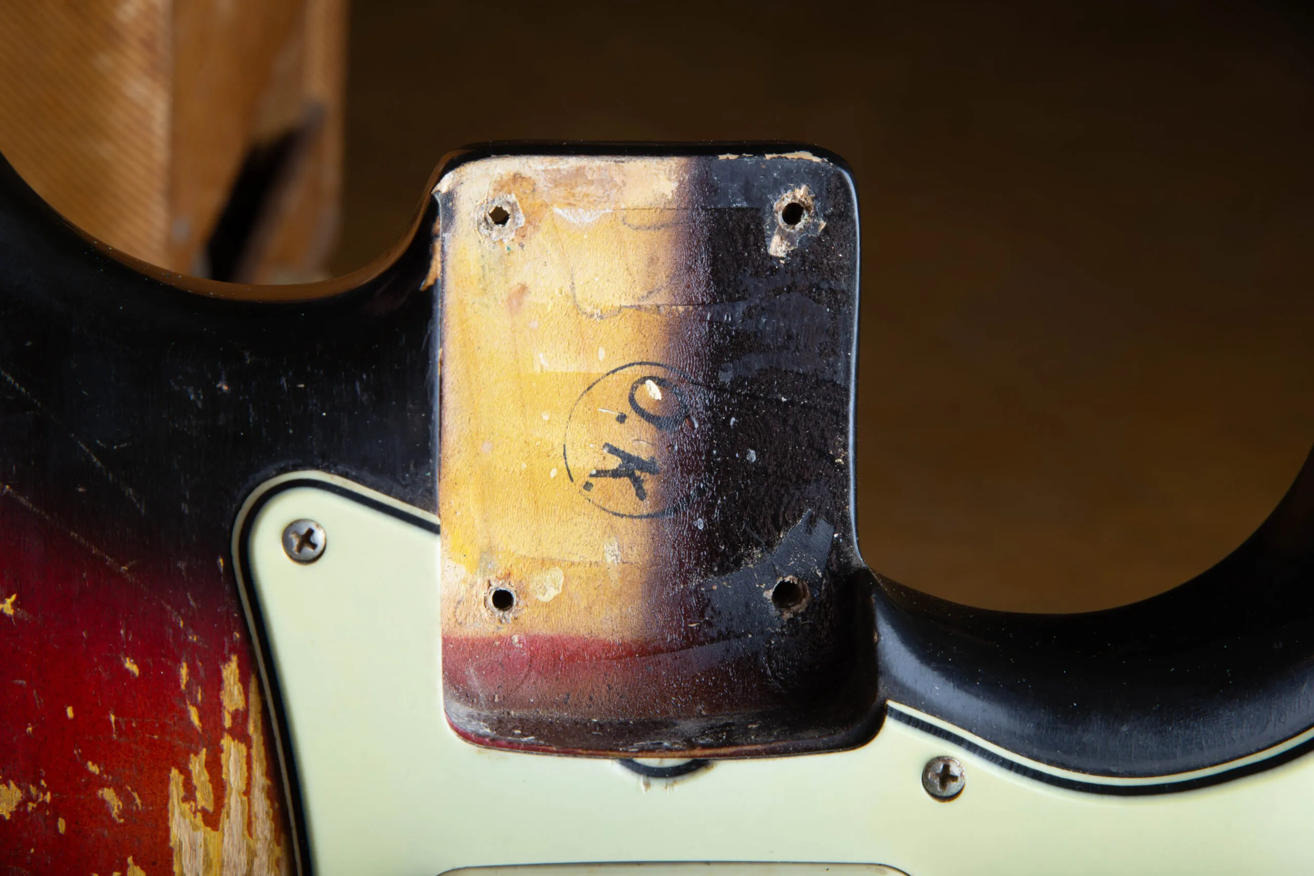 Paint stick shadow visible in the neck pocket of a 1963 Fender Stratocaster