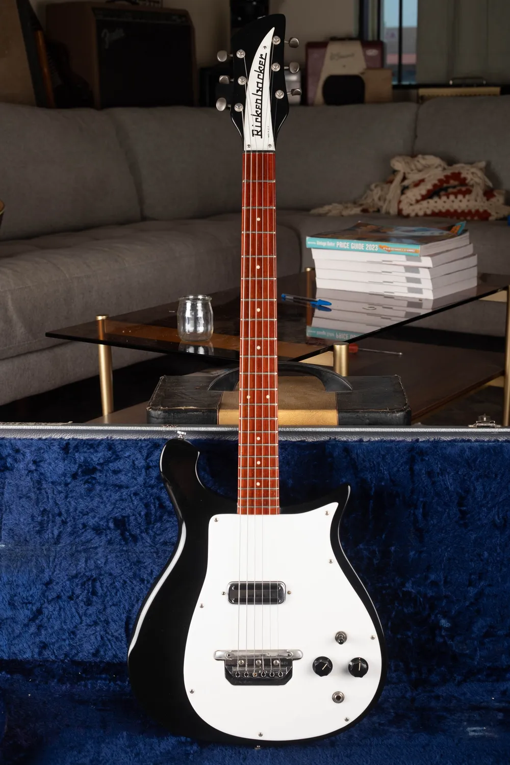 Archive-labeled 1964 Rickenbacker 425 in Jetglo: Full front view showing the compact body and complete neck.