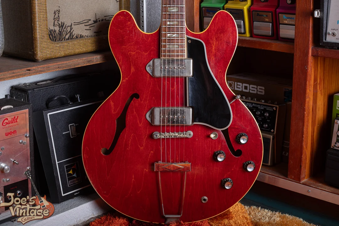Cherry ES-330 with small blocks, metal pickup covers, black reflector knobs and nylon saddles