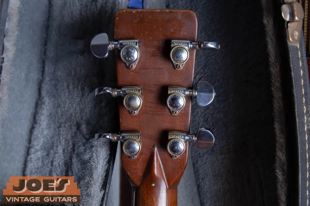 Original Grover Rotomatic enclosed tuners with metal kidney-shaped buttons and patent-pending markings on a 1965 Martin D-28