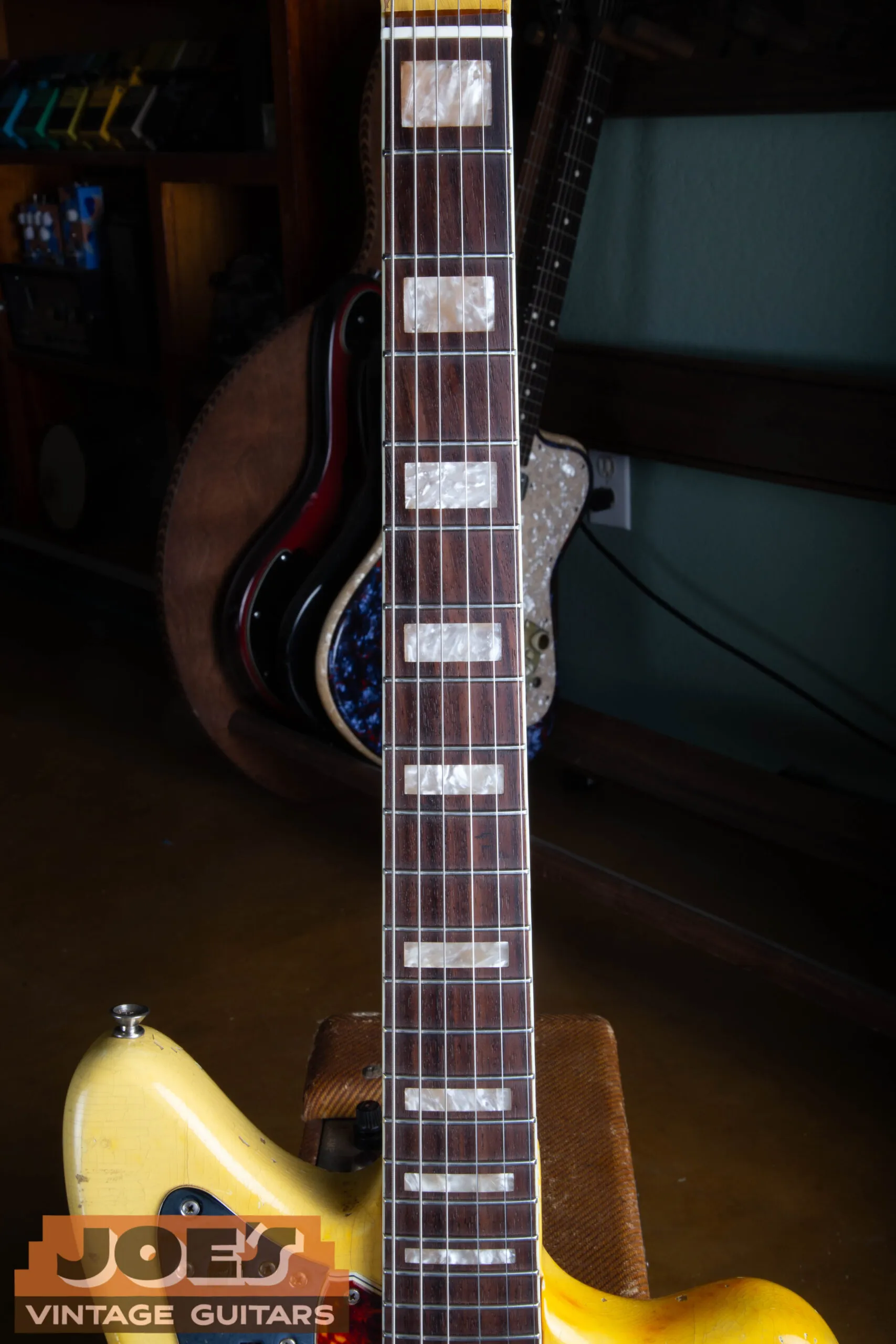 Pearloid block fingerboard inlays on a 1966 Fender Jaguar in Olympic White