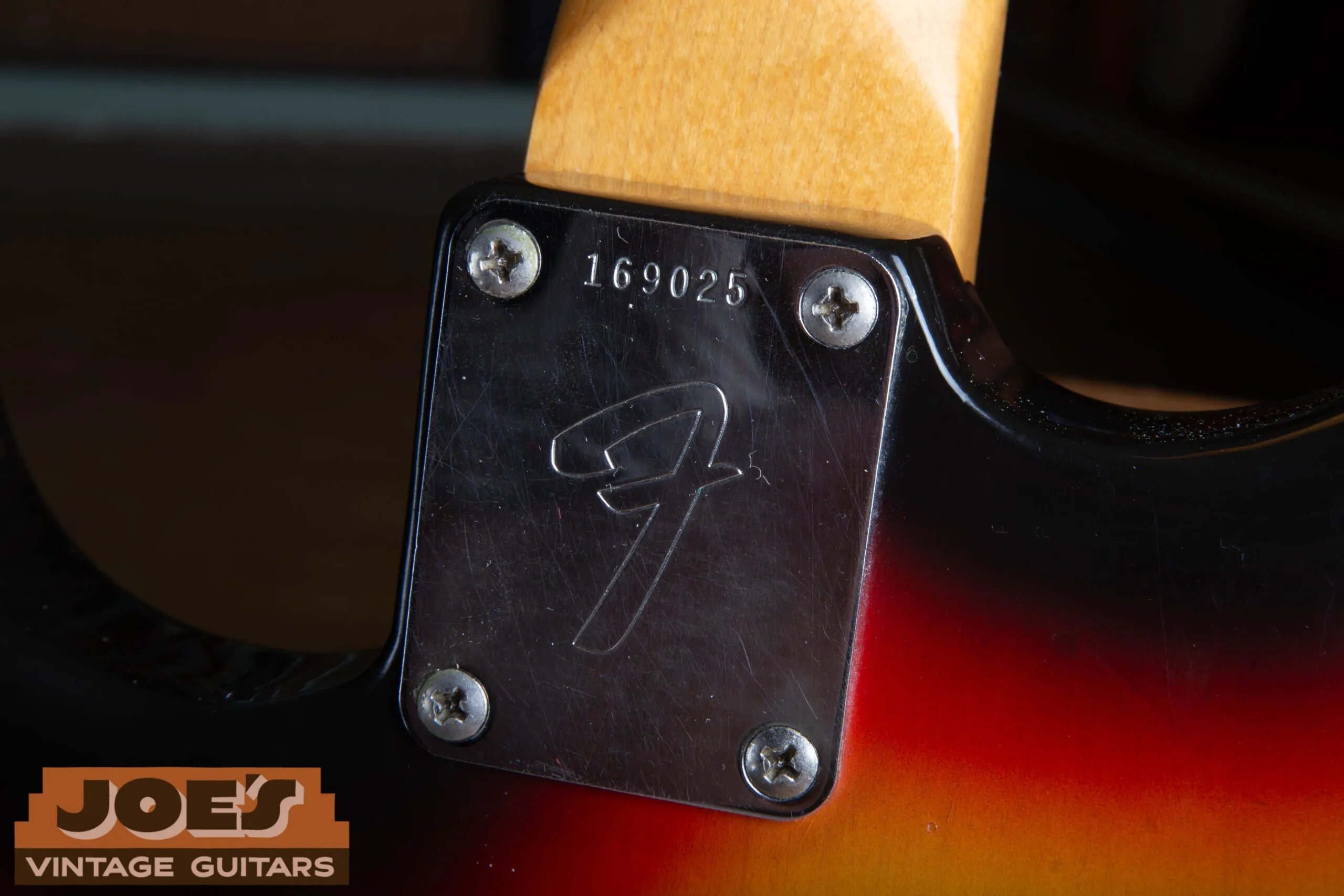F-stamped four-bolt neck plate on a 1966 Fender Stratocaster with serial number 169025