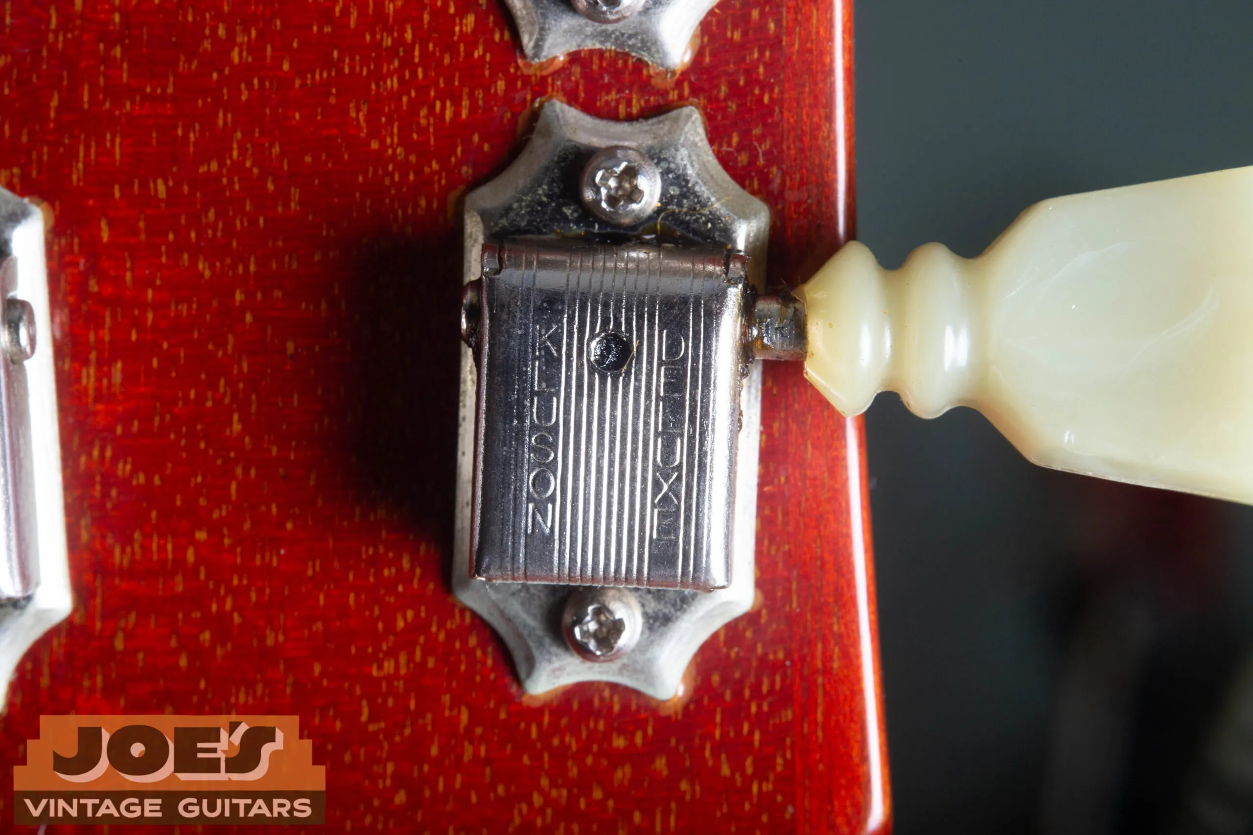 1966 Gibson ES-335 Kluson Deluxe double-line tuner back close-up, KLUSON on first line DELUXE on second line confirming double-line mid-1960s tuner