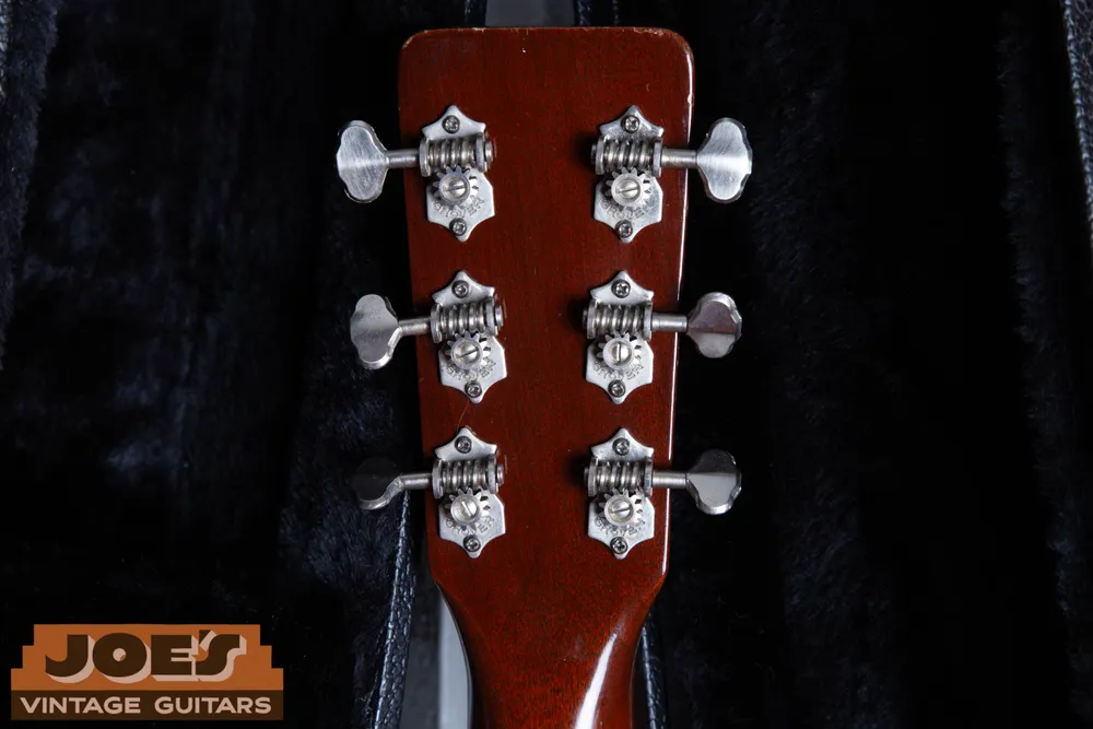 Grover Sta-Tite open-gear tuners with pointed-end plates and scalloped metal buttons on a 1966 Martin 0-18