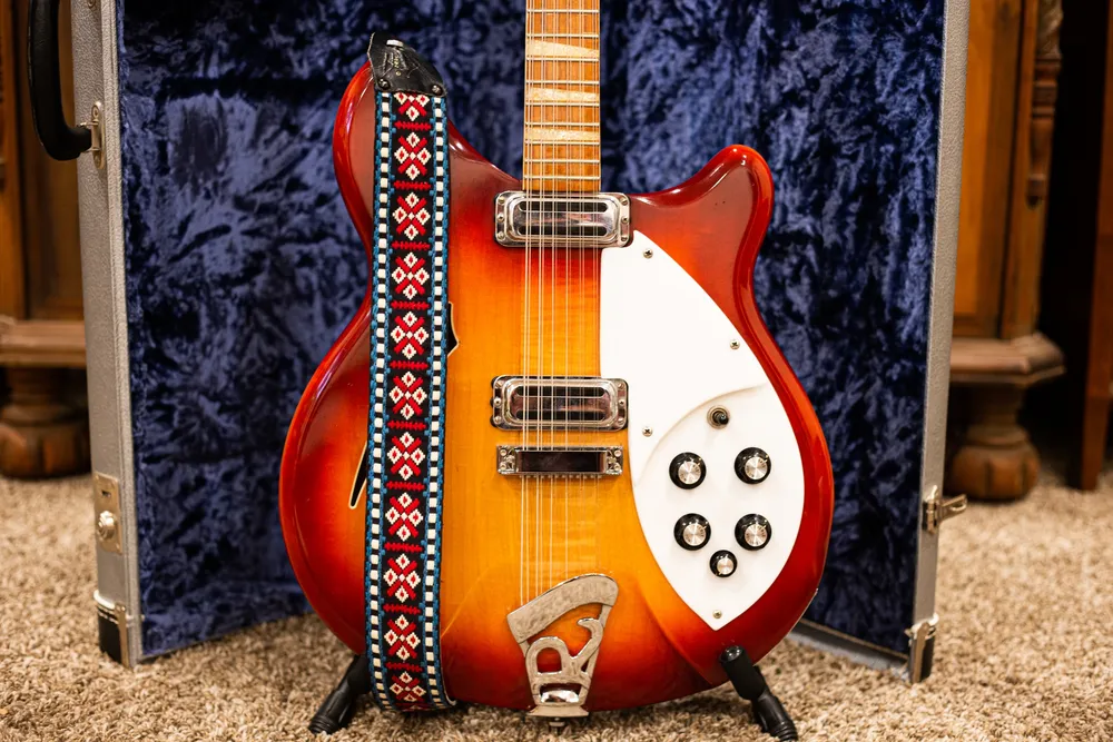 Archive-labeled 1966 Rickenbacker 360/12 in Fireglo: Body, pickups and controls. A clear close-up helps document the bridge and hardware actually fitted.