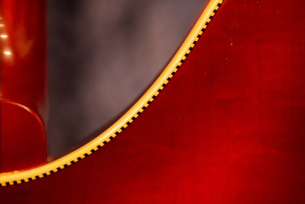 Archive-labeled 1966 Rickenbacker 360/12 in Fireglo: Rear binding detail. Look for shrinkage, replaced sections or separation.