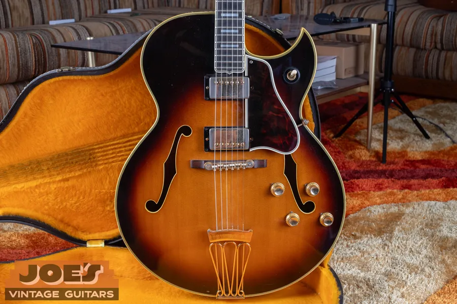 Sunburst Gibson Byrdland with two covered pickups, a pointed cutaway and gold tailpiece in a yellow-lined case