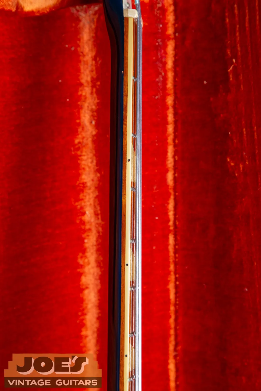 Joe’s 1968 Rickenbacker 4005 in Azureglo: Side view along the neck and body. This angle helps document action and neck-to-bridge geometry.