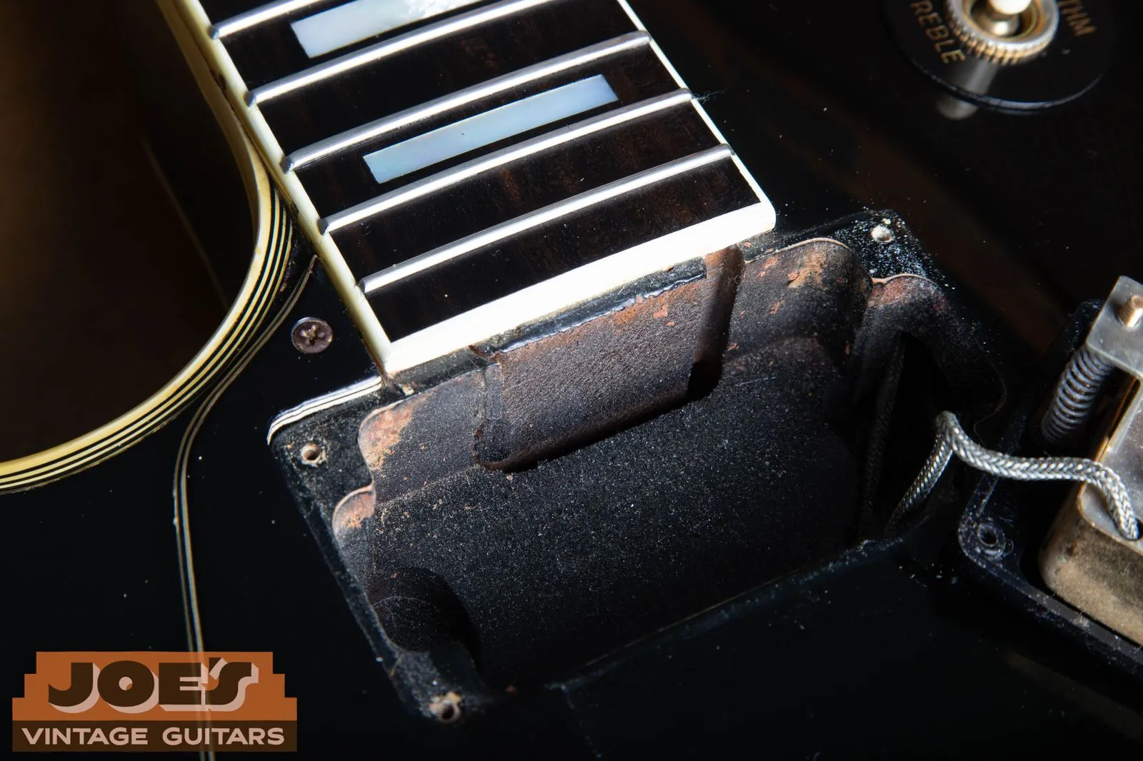 Short neck tenon in the neck pickup cavity of a 1969 Gibson Les Paul Custom