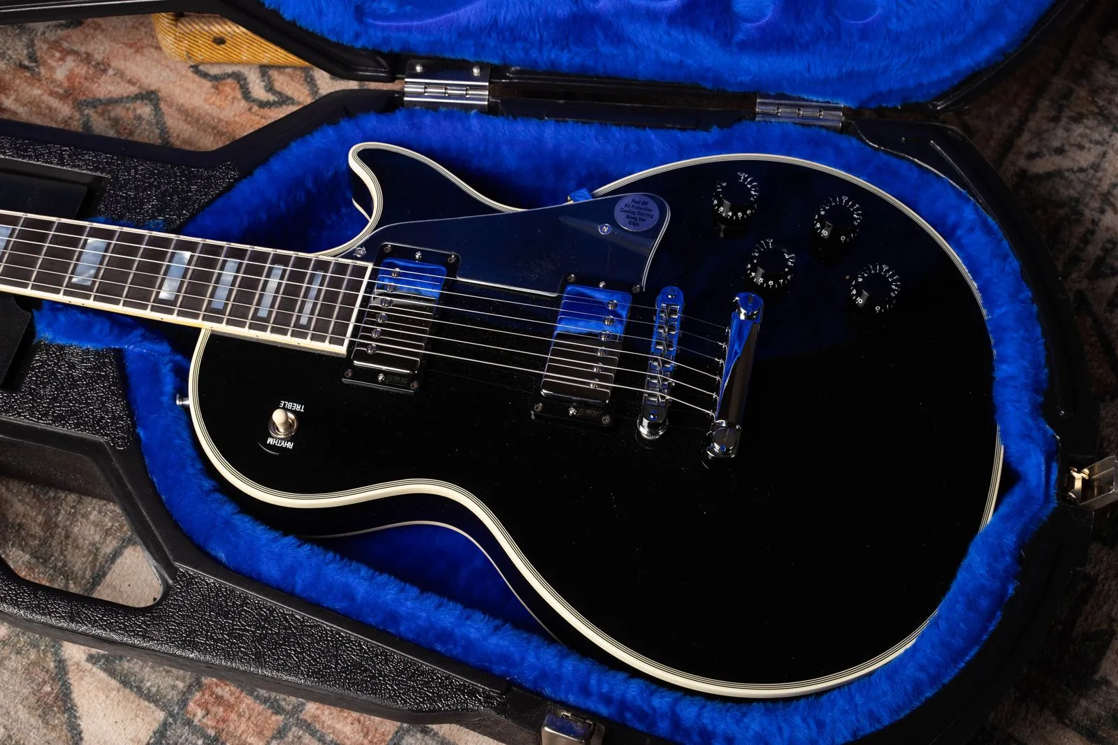 Black 1985 Gibson Les Paul Custom with chrome pickup covers, bridge and stopbar