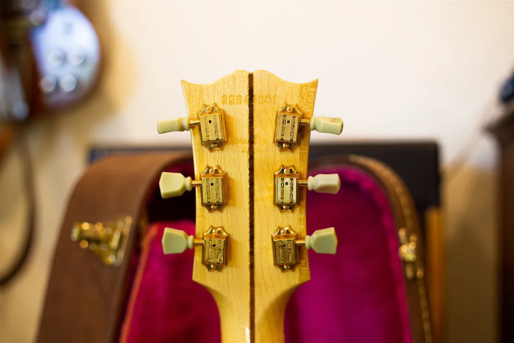Serial 92840001 on the maple headstock of a 1990 Gibson J-200