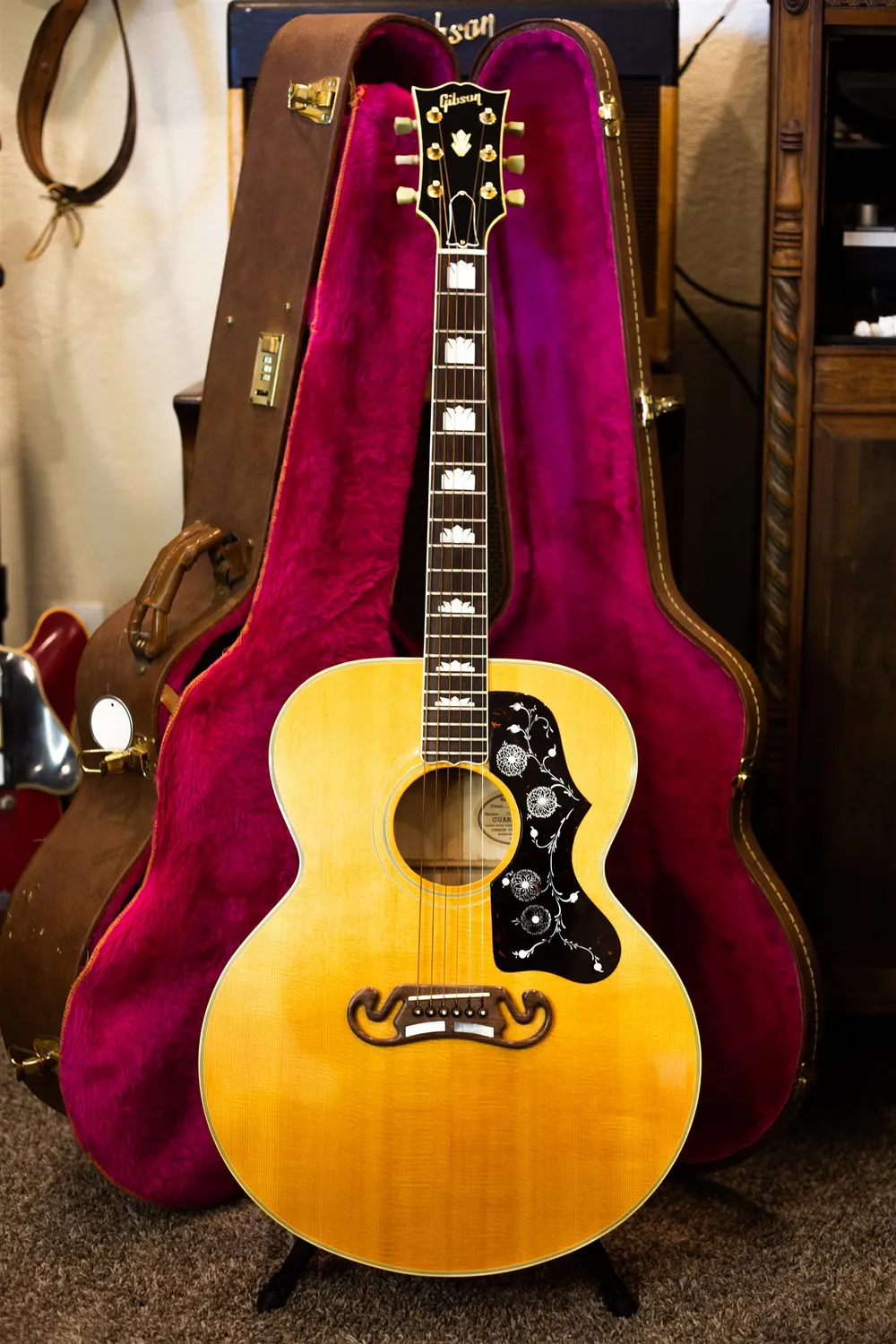 Natural 1990 Gibson J-200 full front in its purple-lined case