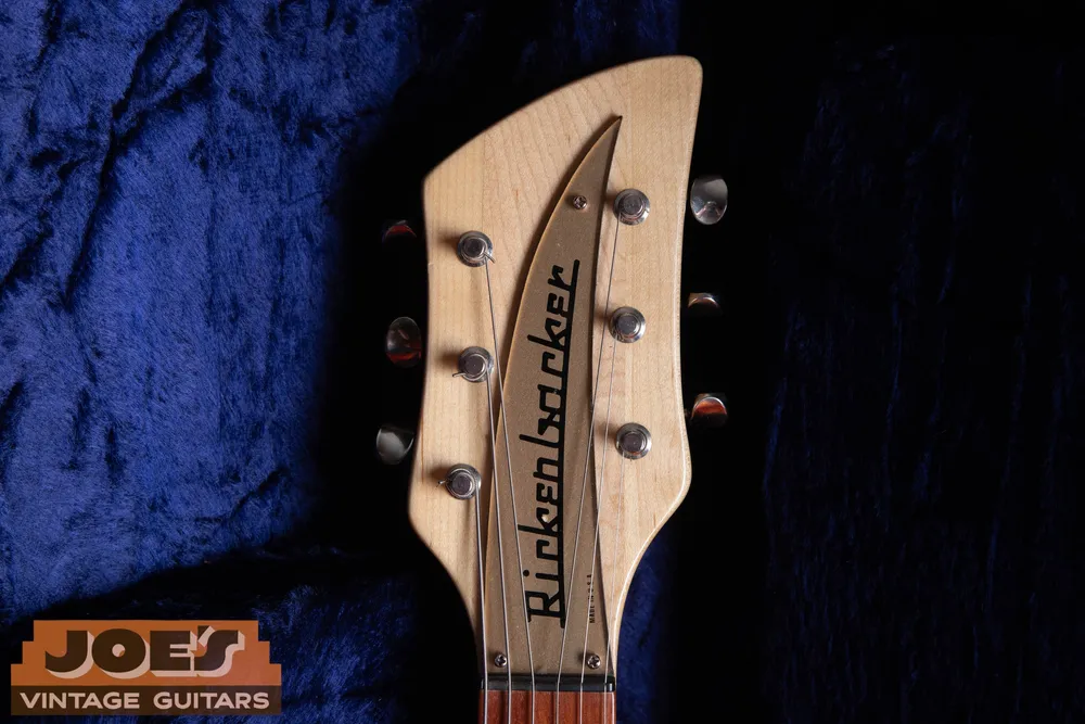 1997 Rickenbacker 325, later-production comparison: Front headstock and gold nameplate. The nameplate must be checked alongside the serial and construction.