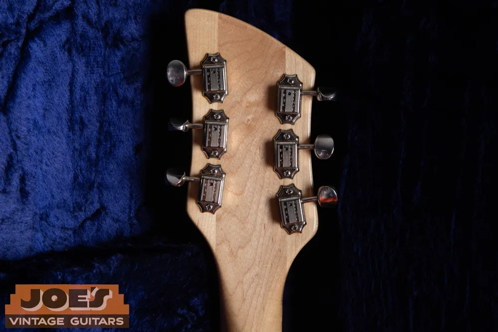 1997 Rickenbacker 325, later-production comparison: Rear headstock and tuner mounting. Look for additional screw holes and changed footprints.